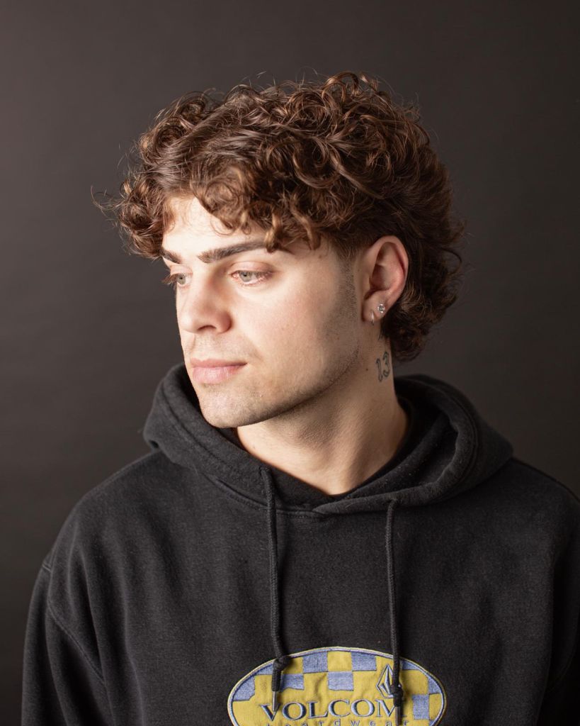 Rizos naturales con fade — MAGNO